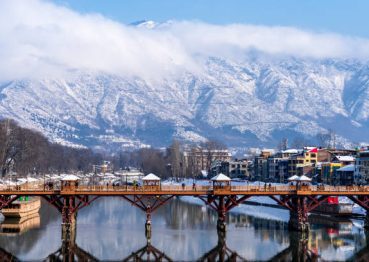 Beautiful scenery of Zero bridge with Himalaya mountain covered with snow in the background.
